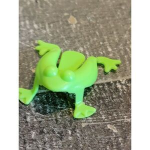 Light green mini Leap Frog toy figure